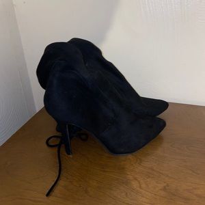 Black heeled over the knee boots